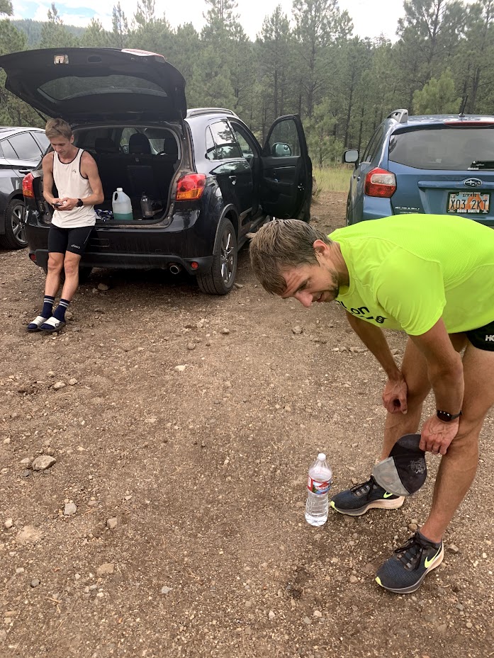 Two people preparing for outdoor activity
